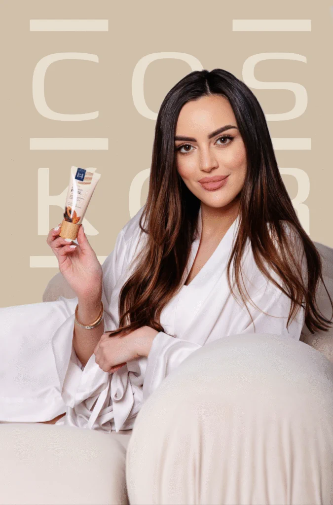 Monika, founder of COSKOR, holding Eraser Enzyme Peel